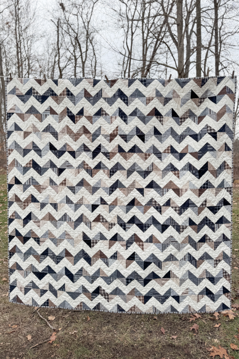 Full view of the finished Zig Zag Quilt featuring Farmhouse Flannels 2 in a zig-zag layout.