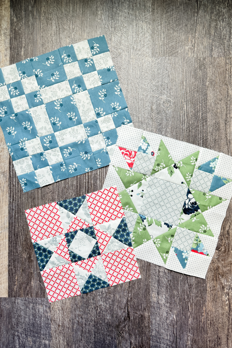 Month 9 quilt blocks from the Piece and Quilt Sampler featuring Album Star, Building Blocks, and Union Square.