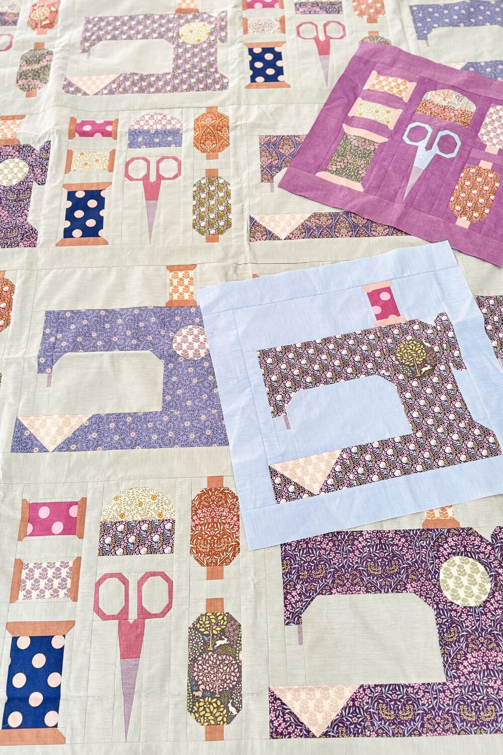 Unquilted Make Do and Mend quilt top with two matching pillow tops made from Tilda fabrics.