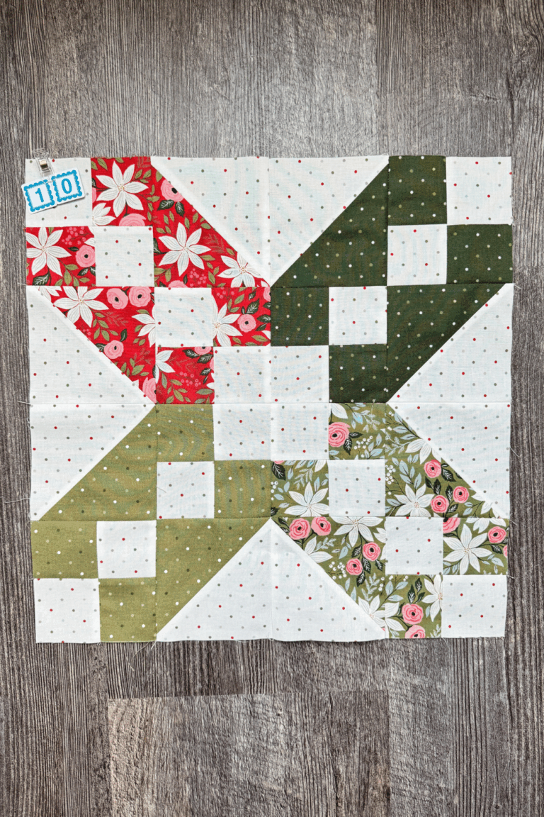 Finished XOXO quilt block from the Jolly Bar 5 Quilt Along using Berry & Pine fabrics.