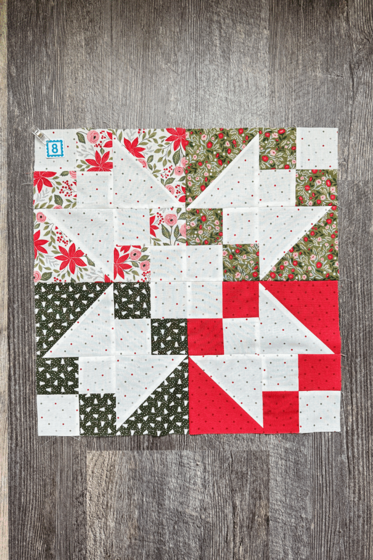 Alt Text: Styled image of the completed Variations block made from four 8.5-inch blocks in the Jolly Bar 5 Quilt Along.