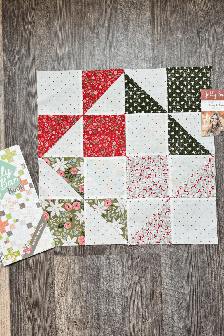 Jolly Bar 5 book with a completed Northern Lights block made with Berry and Pine fabric.