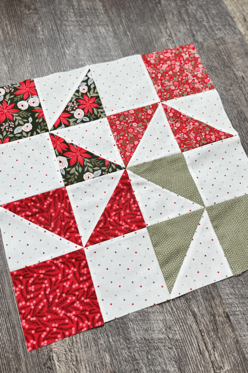 Completed Somersaults block from the Jolly Bar 5 quilt along.  Made with half square triangles and square pieces.  
