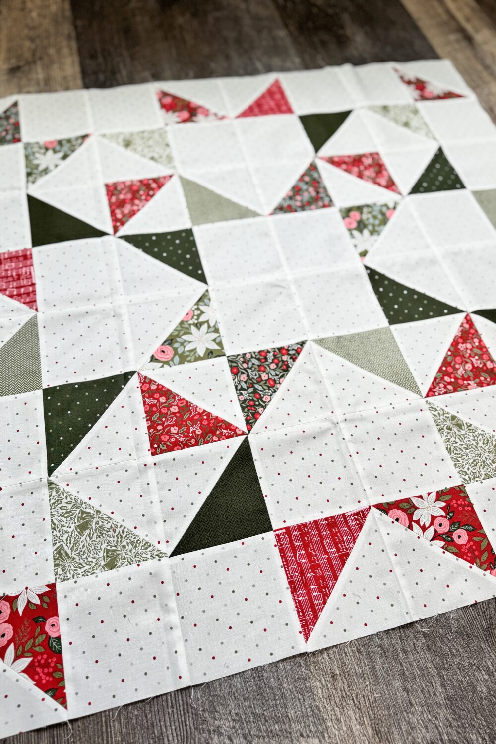 Angled view of the completed Scattered Stars quilt block