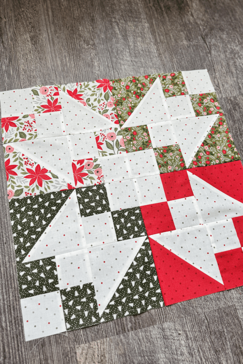 Angled overhead close-up of the finished Variations block showing fabric details and piecing in the Jolly Bar 5 Quilt Along.
