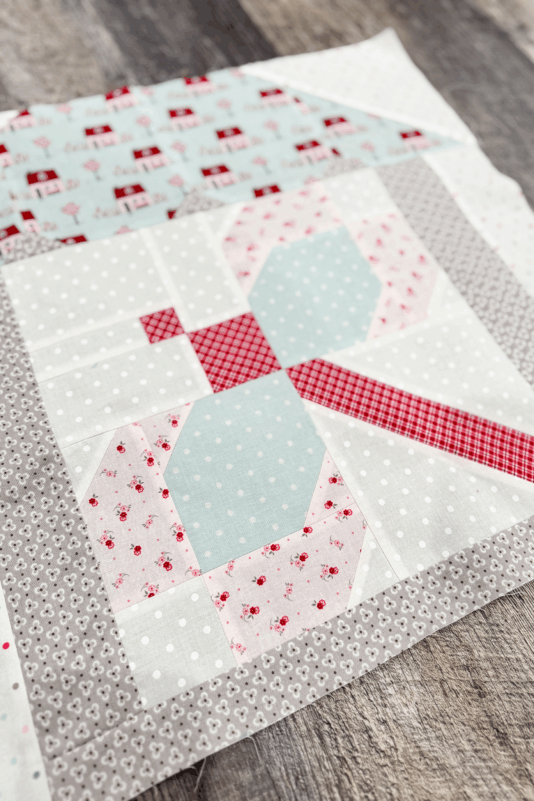 Sweet Dreams quilt block in house setting ready to be part of the final quilt row.