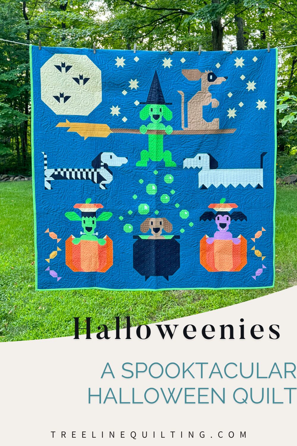 Full view of the Halloweenies Quilt by Art East Quilting Co., featuring seven weiner dogs in Halloween costumes with moon, bats, and pumpkins.