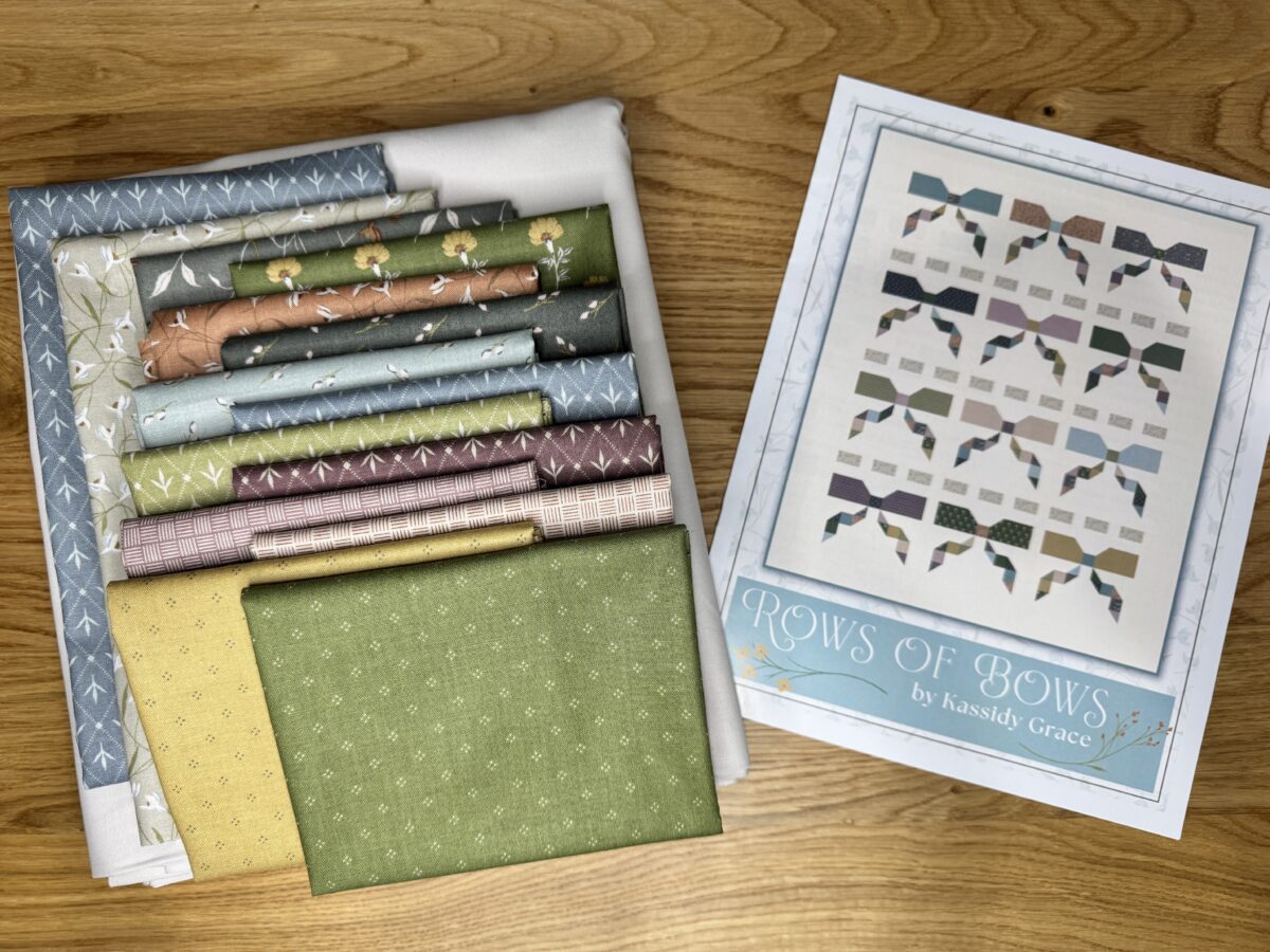 Rows of Bows Quilt Kit by Kassidy Grace for Riley Blake Designs, featuring Threads of Grace fabrics. Finished size 66.5" x 78.5".