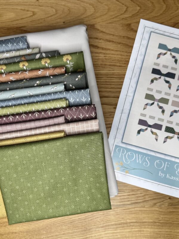 Rows of Bows Quilt Kit by Kassidy Grace for Riley Blake Designs, featuring Threads of Grace fabrics. Finished size 66.5" x 78.5".