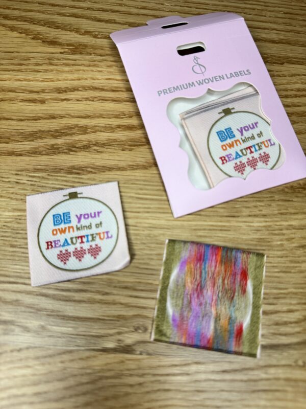 Minki Kim Own Kind Woven Labels, set of 8 hand-drawn polyester labels measuring 1¾" square, perfect for handmade quilts and sewing projects.