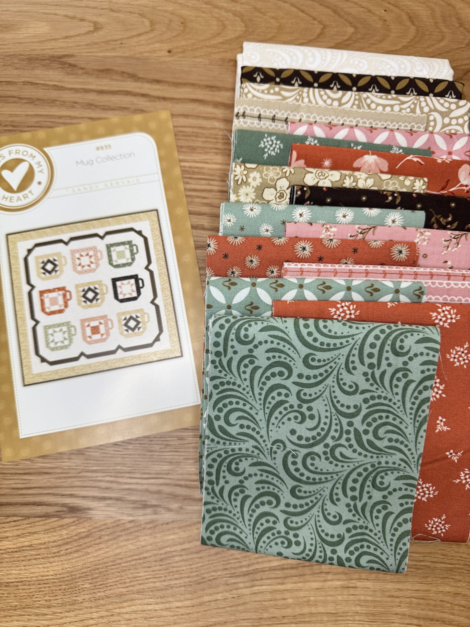 Mug Collection quilt kit including pattern and all fabrics for quilt top and binding.