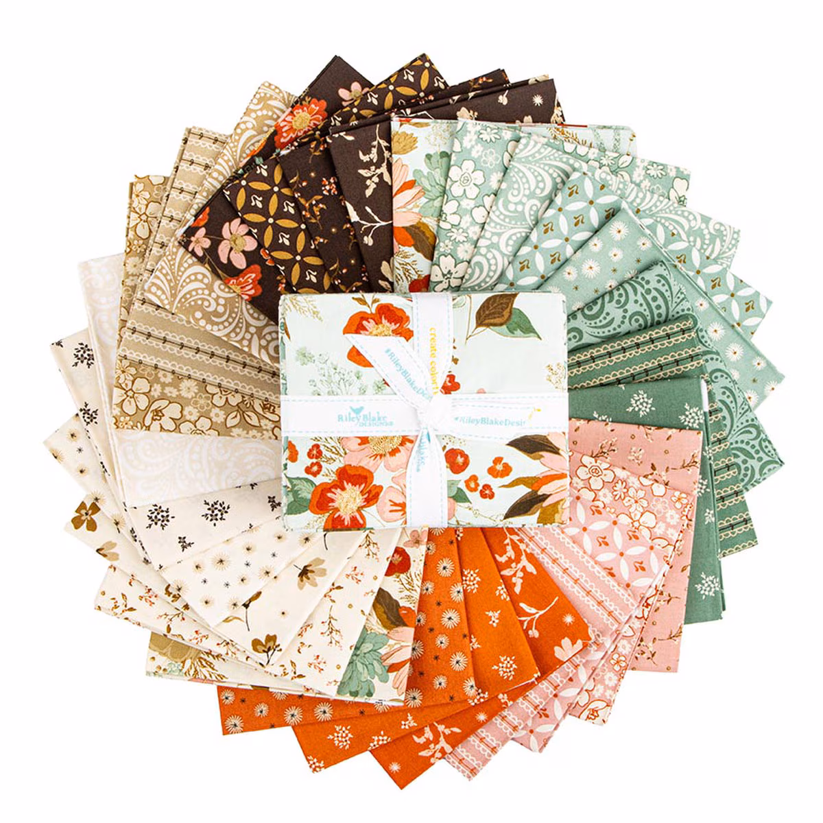 The Morning Latte Fat Quarter Bundle includes 28 fat quarters from the Morning Latte collection by Sandy Gervais for Riley Blake Designs. Each piece measures 18" x 21" and features coordinating prints in espresso, latte, pink, aloe, and spice hues — perfect for quilting and home décor projects.