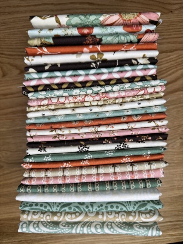 Morning Latte Fat Quarters The Morning Latte Fat Quarter Bundle includes 28 fat quarters from the Morning Latte collection by Sandy Gervais for Riley Blake Designs. Each piece measures 18" x 21" and features coordinating prints in espresso, latte, pink, aloe, and spice hues — perfect for quilting and home décor projects.