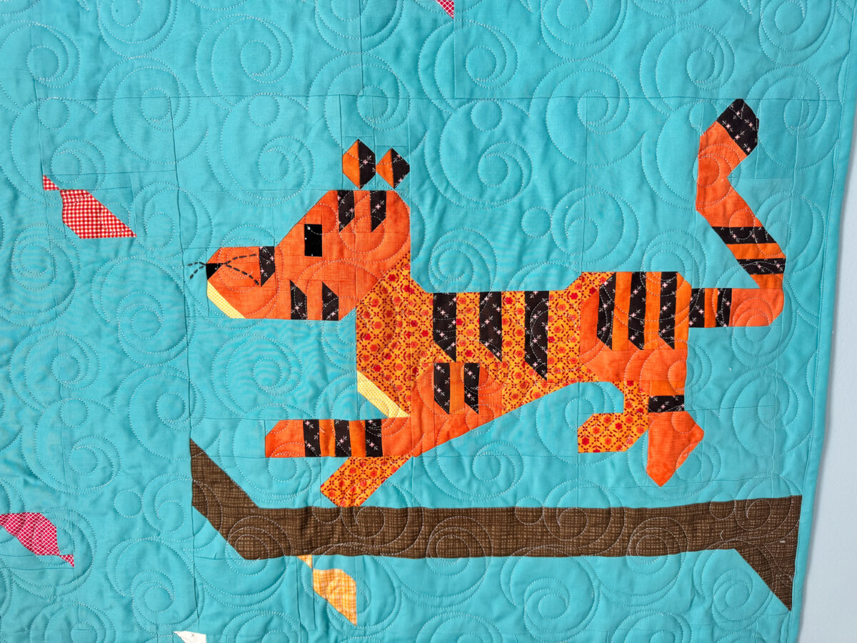 Close-up of Tigger quilt block on the smaller Winnie the Pooh quilt.