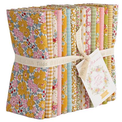 Tilda Creating Memories Spring Fat Quarter Bundle with 16 coordinated pastel prints and wovens.