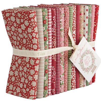 Tilda Creating Memories Winter Fat Quarter Bundle featuring 16 coordinated red and green prints and wovens.