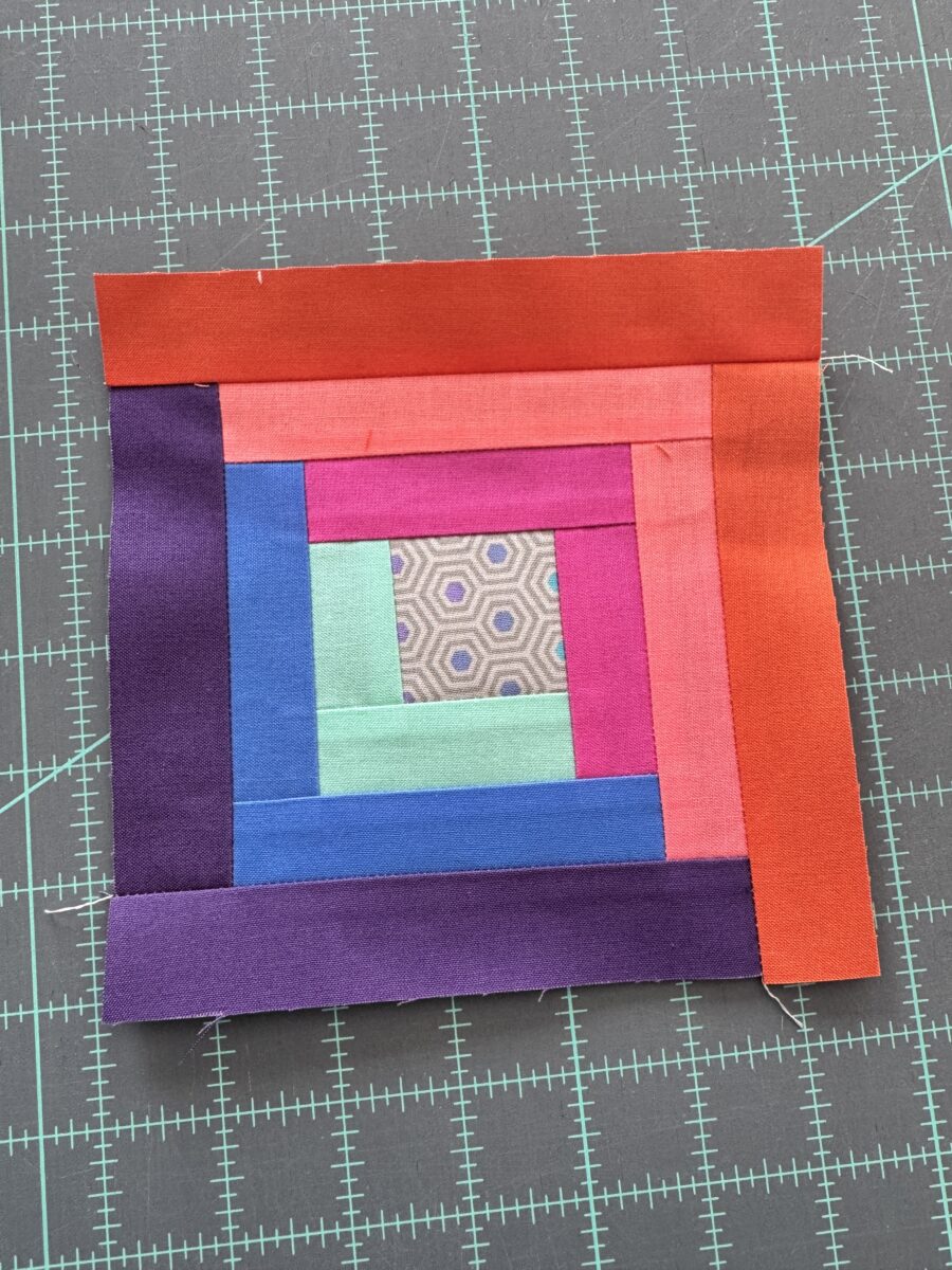finished classic Log cabin quilt block.