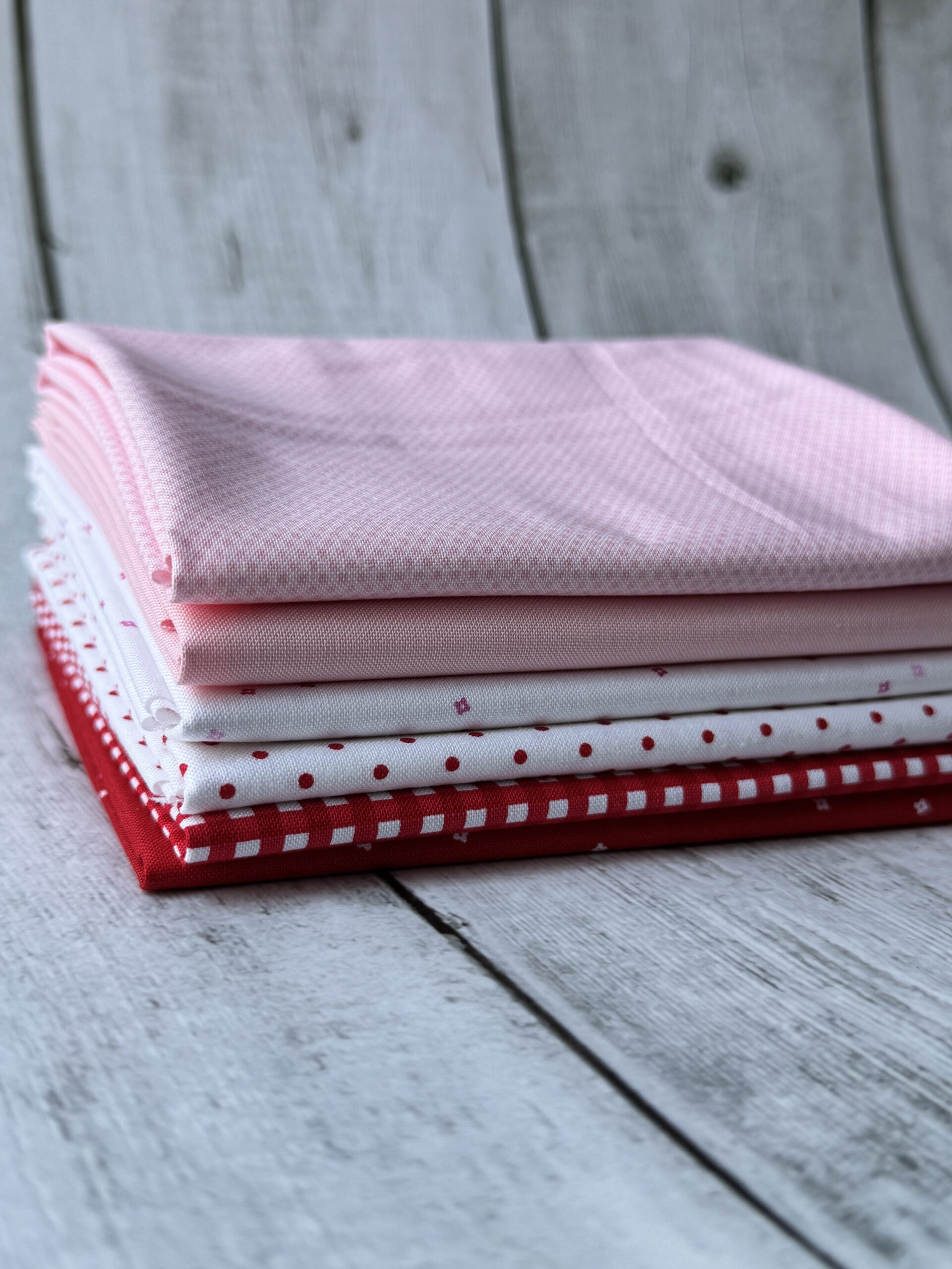 Stacked Hugs Seasonal Basics Petite fat quarter bundle with red and pink Riley Blake Basics