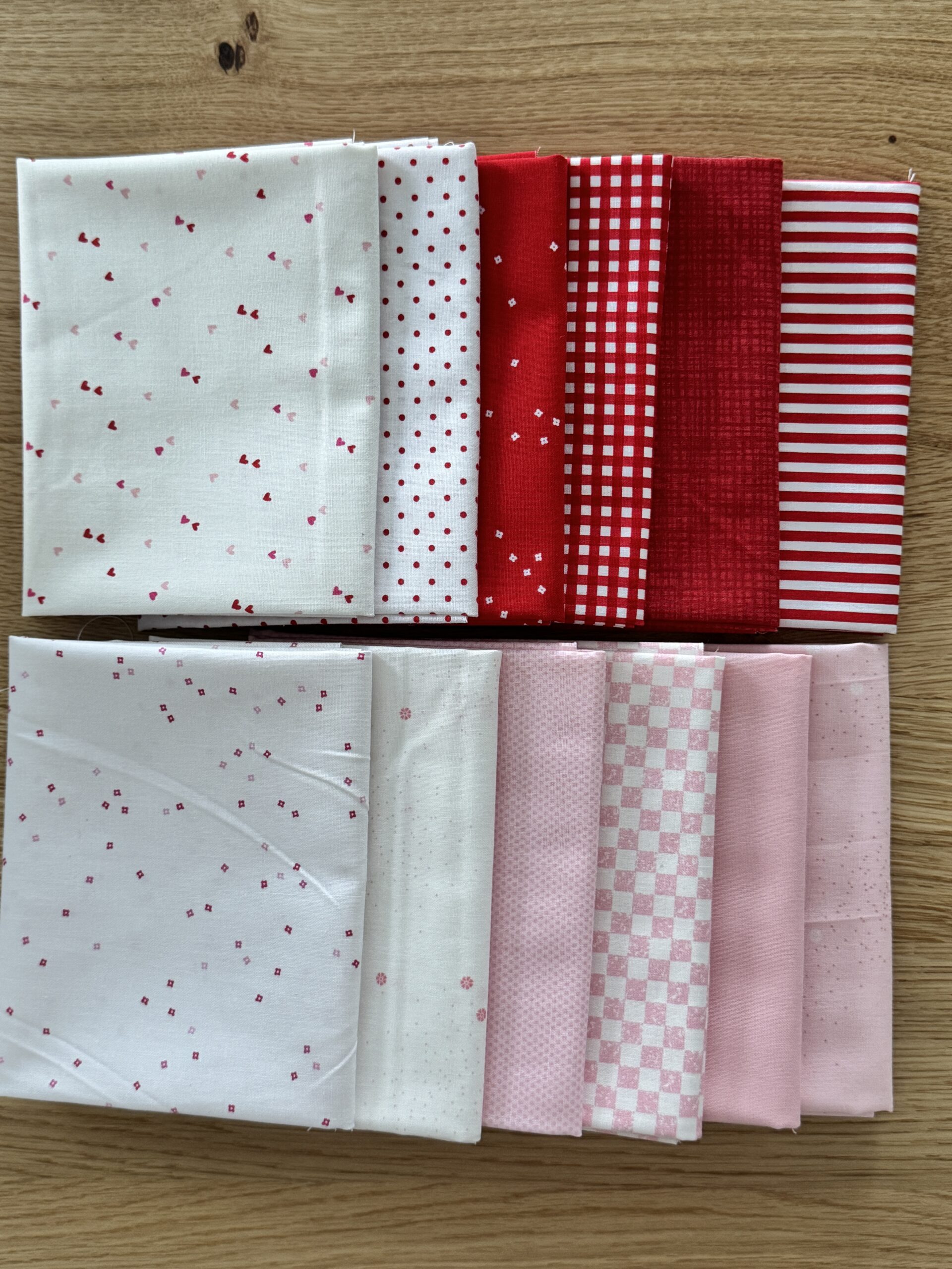 Sweetheart Seasonal Basics fat quarter bundle arranged in two rows with pink and red Riley Blake Basics