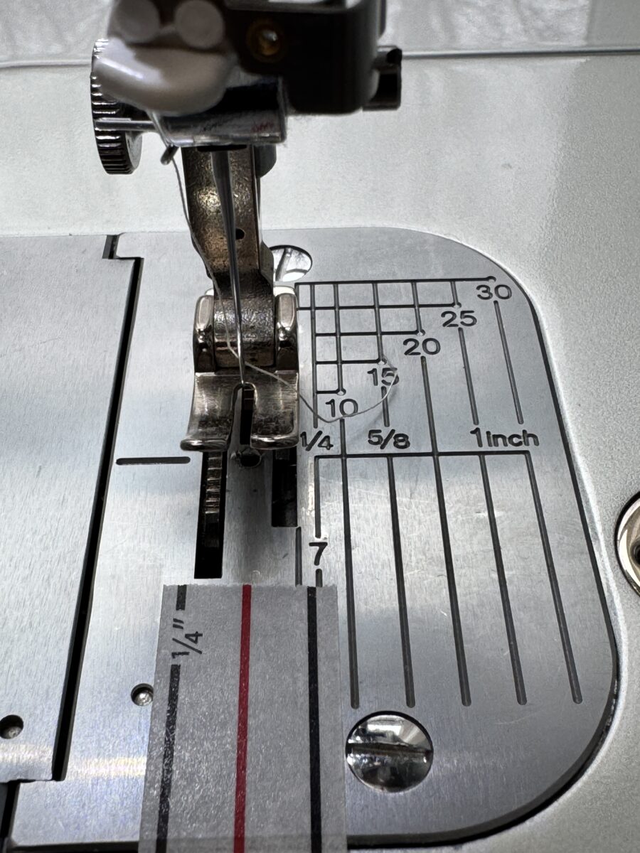 Close up view of the machine plate markings and diagonal seam tape