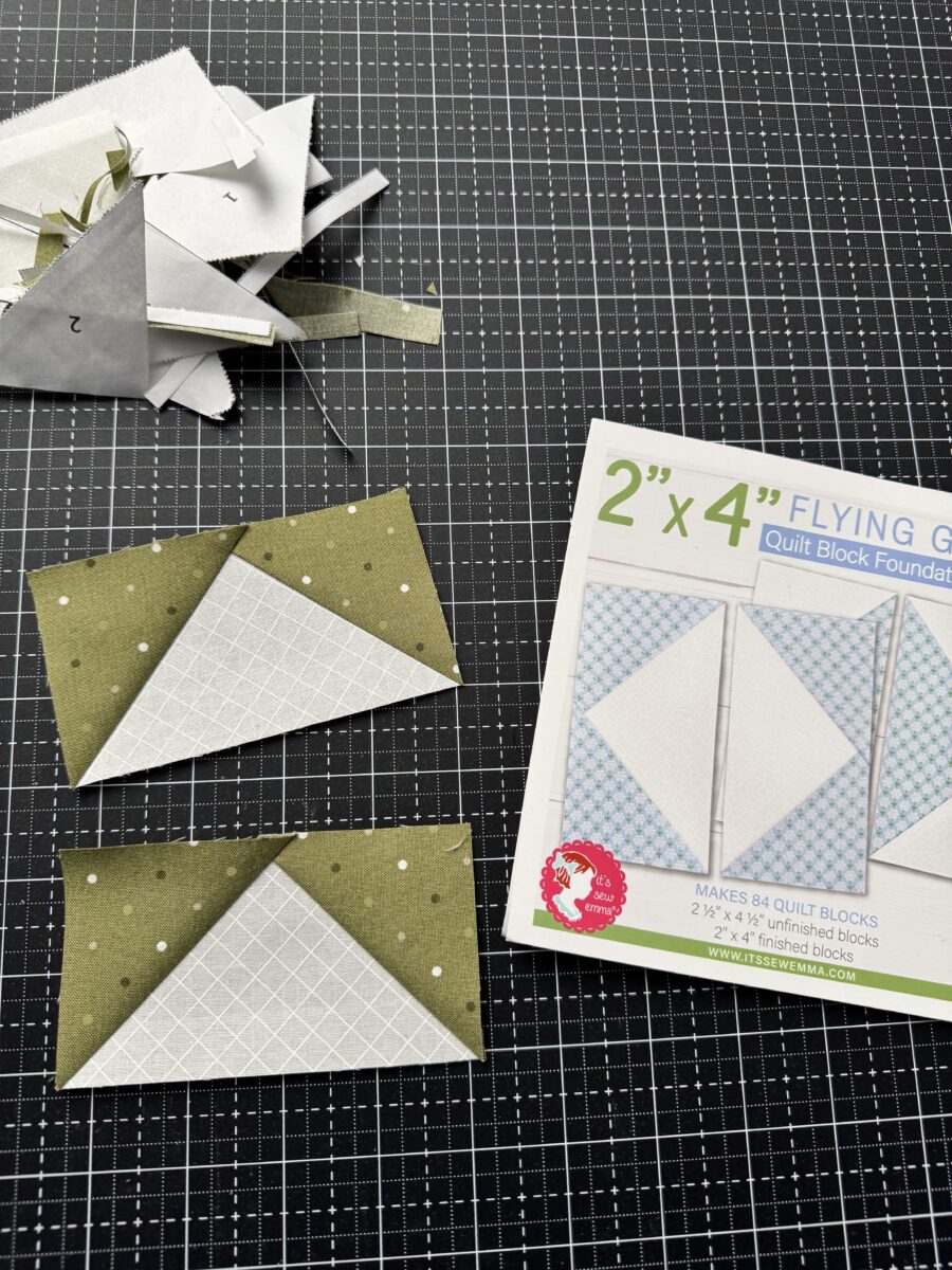 Two completed flying geese quilt units made using foundation paper piecing with crisp points and accurate seams