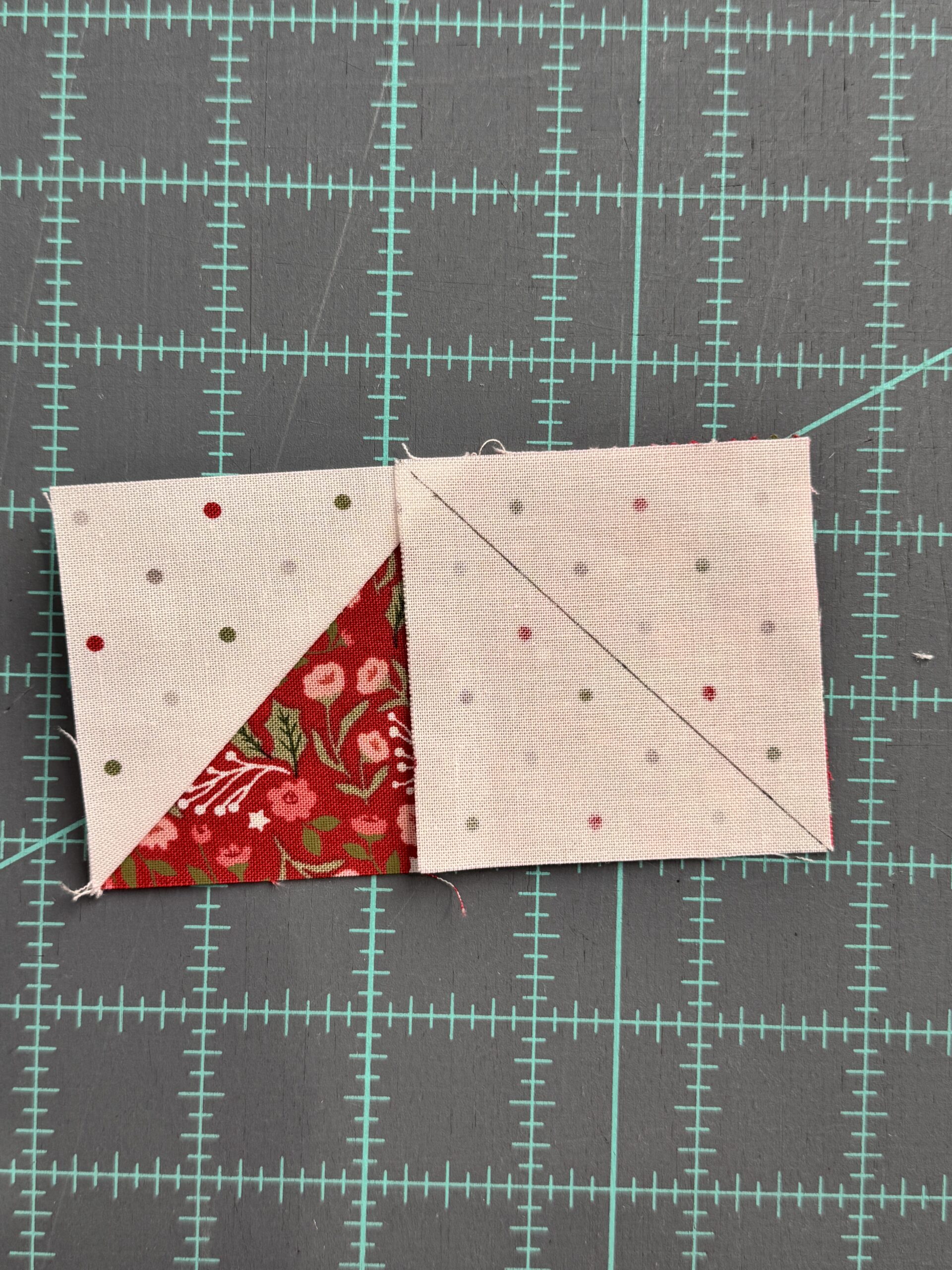 placing second square on flying geese rectangle for stitch and flip