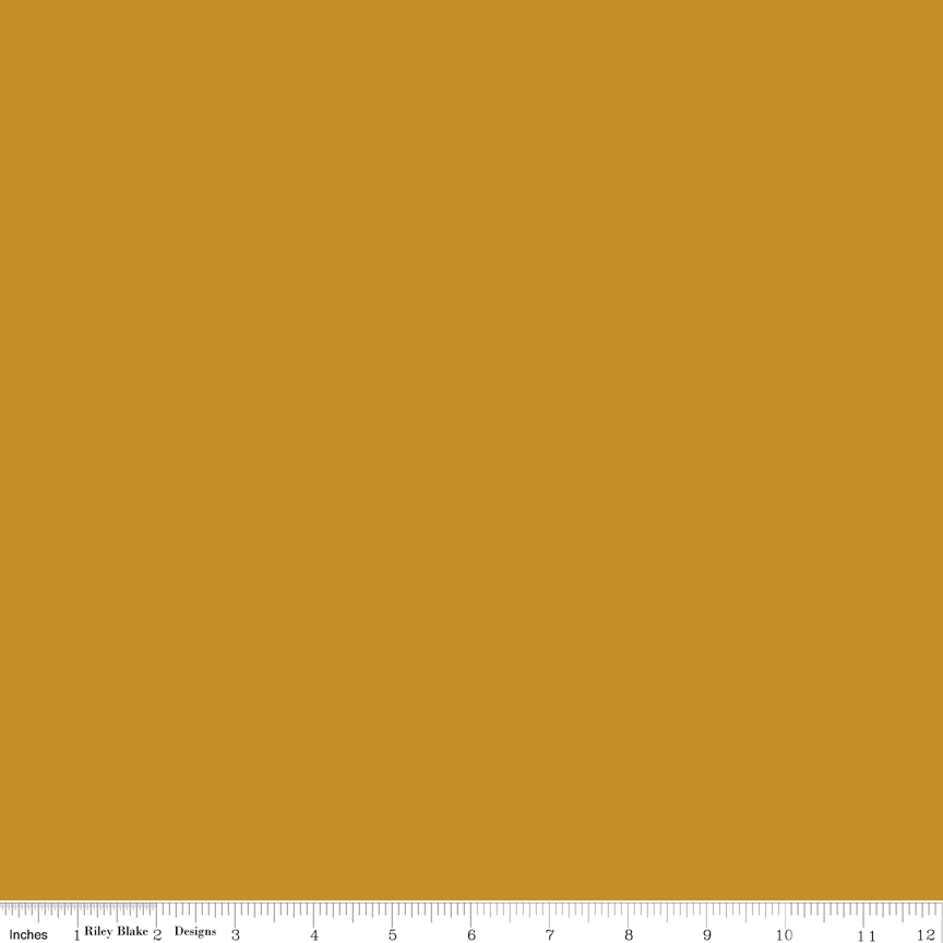 Confetti Cotton Cider fabric by Riley Blake Designs orange brown solid quilting fabric