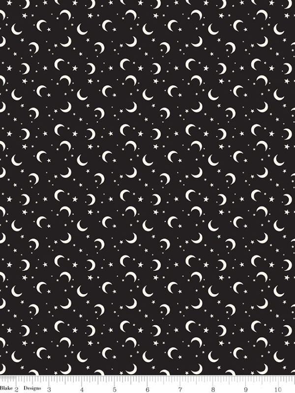 Frank and Friends fabric by My Mind’s Eye with crescent moons and stars, glow in the dark quilting cotton