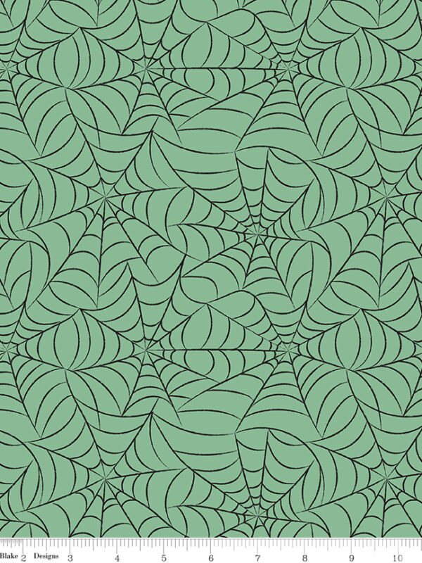 Frank and Friends Webs Green fabric with spiderweb pattern