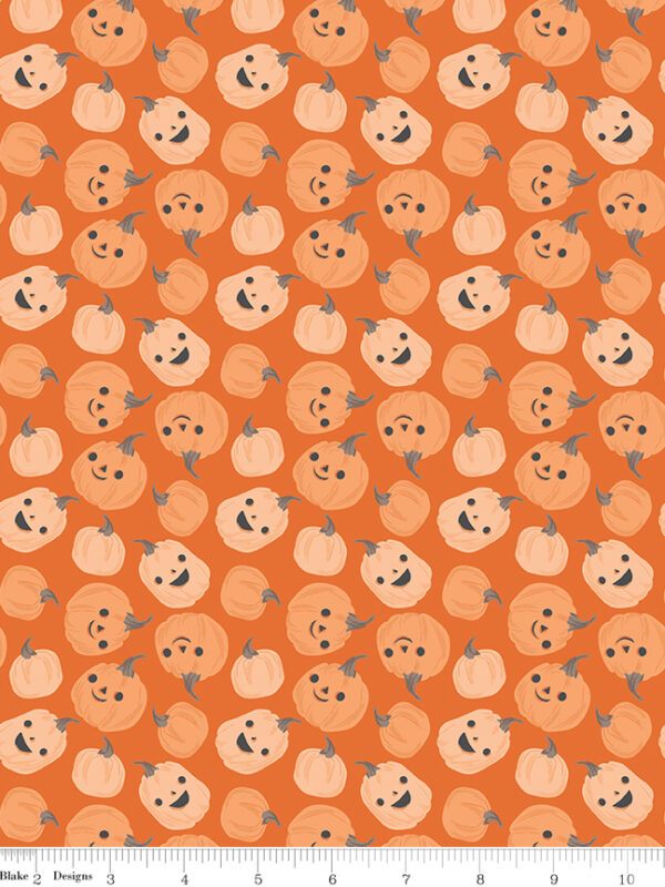 Frank and Friends Pumpkins Orange fabric with smiling pumpkins