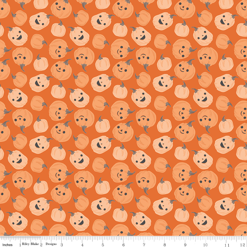 Frank and Friends Pumpkins Orange fabric with smiling pumpkins