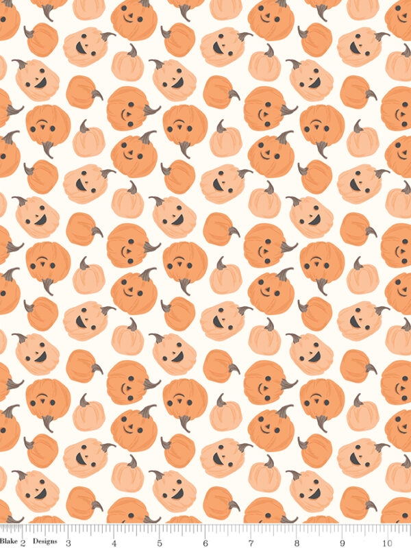 Frank and Friends Pumpkins Cloud fabric with smiling pumpkins on light background