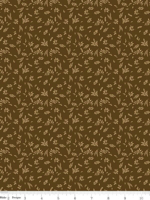 Bountiful Leaves Brown fabric with scattered leaf pattern on brown background