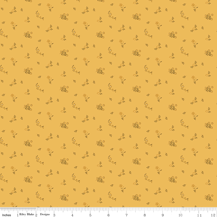 Bountiful Flower Toss Yellow fabric with small flowers and leaves pattern