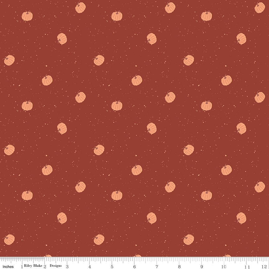Apothecary Pumpkin Toss Rust fabric with scattered pumpkins on speckled background