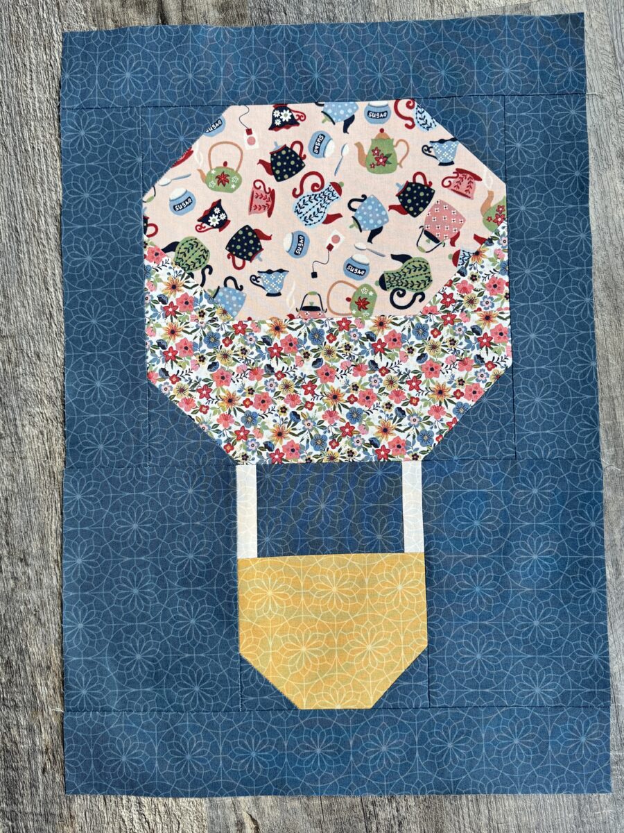 Hot air balloon quilt block from Cherry Tree Lane Quilt Along made with Spoonful of Sugar fabric
