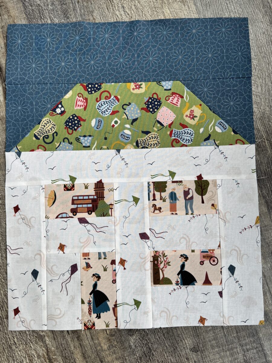 House quilt block with Spoonful of Sugar fabrics featuring fussy cut windows and door