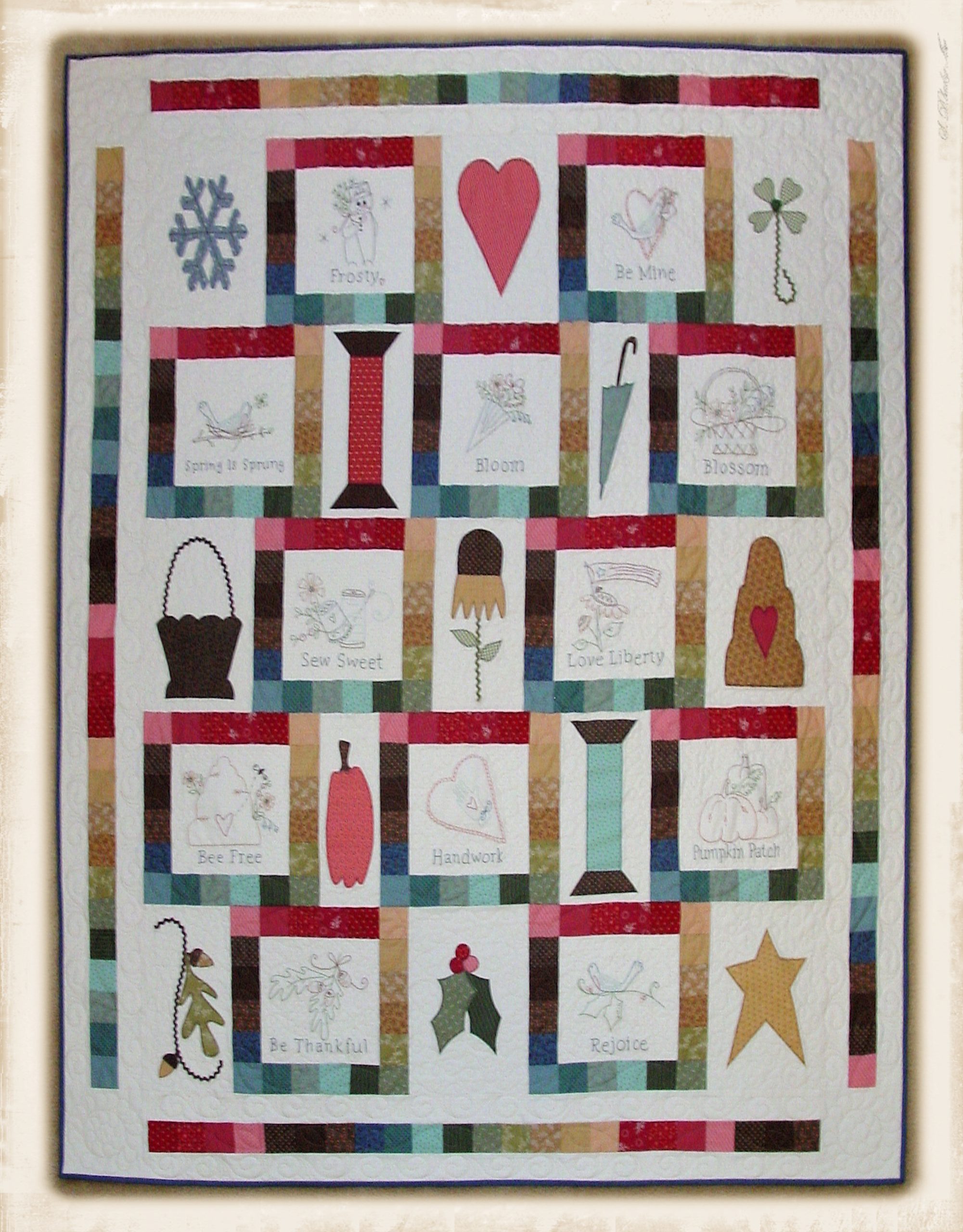 A Charmed Life quilt pattern by Plumcute featuring embroidery and appliqué design