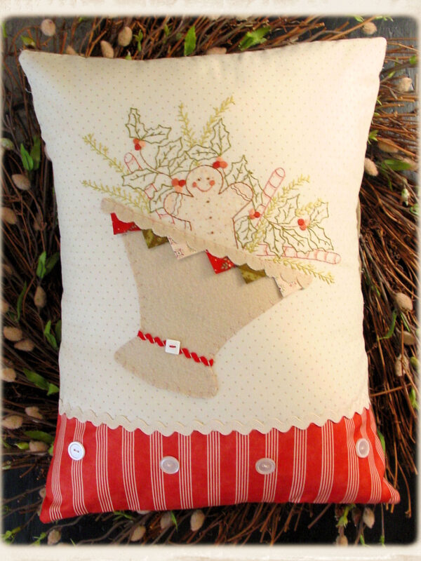 Gingerbread Christmas pillow pattern by Plumcute featuring embroidery, wool appliqué, and prairie point details