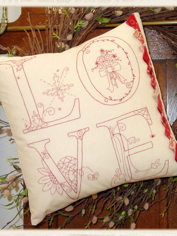Love redwork pillow pattern by Plumcute featuring seasonal stitchery inside each letter