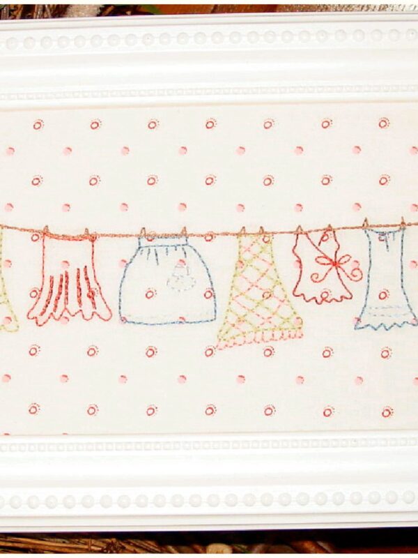 On the Line embroidery pattern by Plumcute Designs featuring a laundry on the line stitchery design