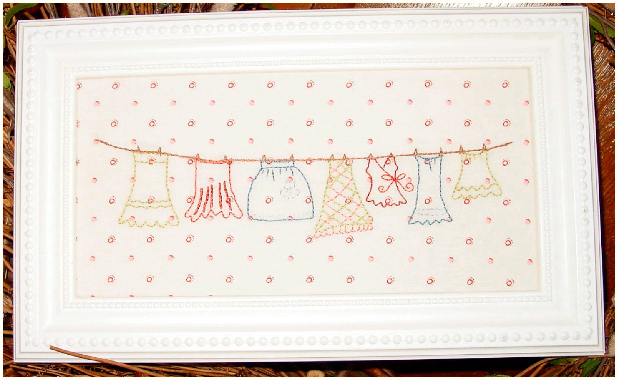 On the Line embroidery pattern by Plumcute Designs featuring a laundry on the line stitchery design
