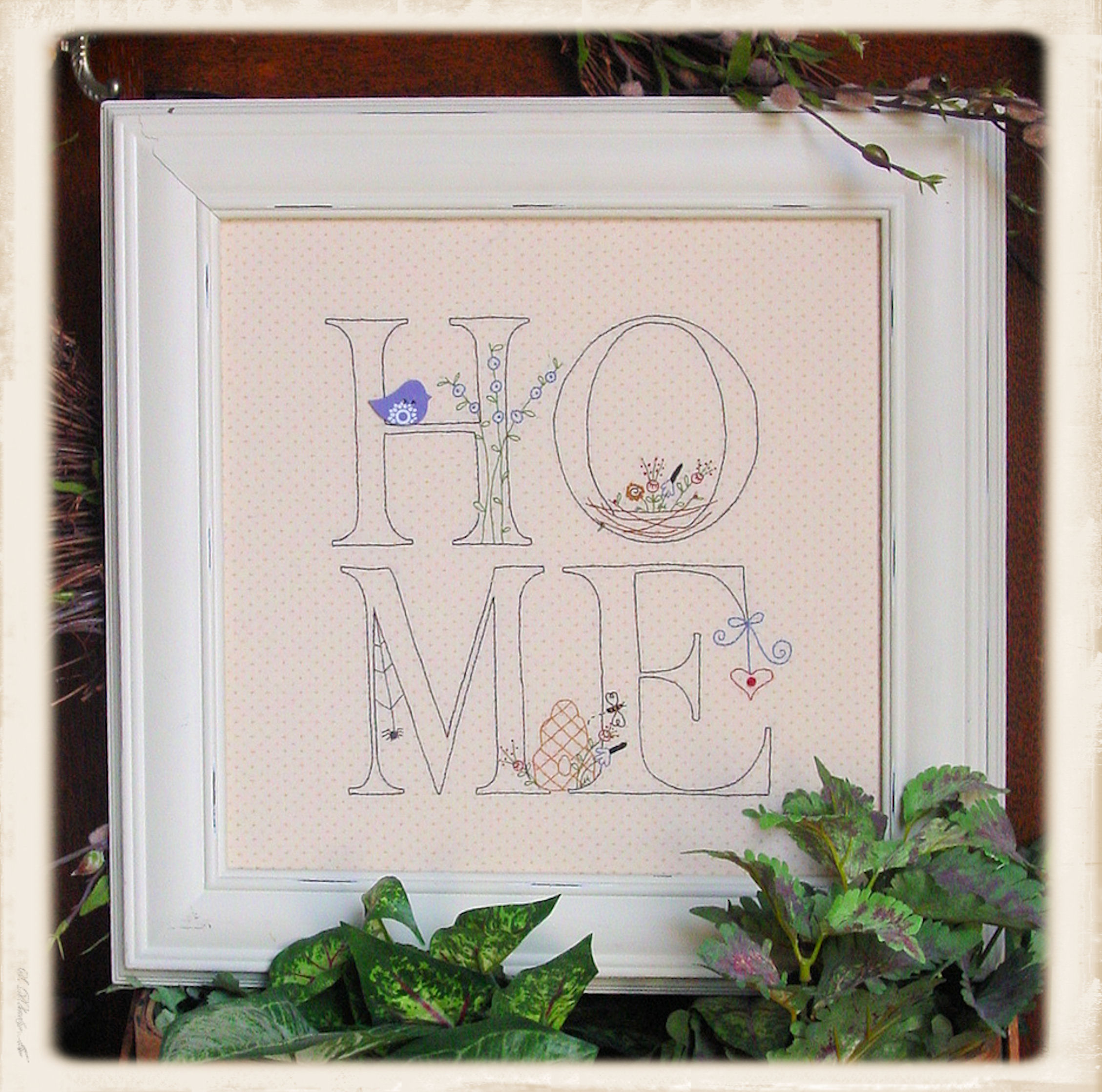 Home embroidery pattern by Plumcute Designs featuring stitchery with bird and red button embellishments
