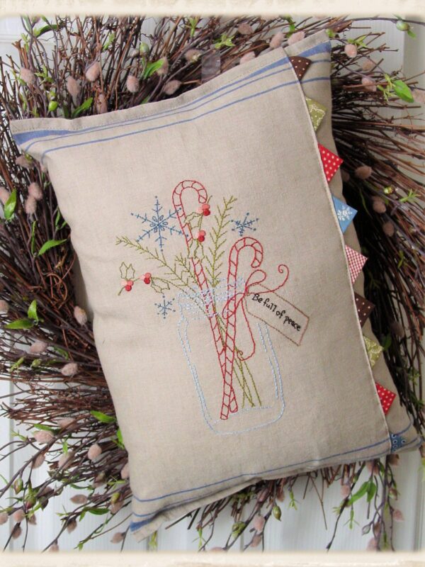 Be Full of Peace pillow pattern by Plumcute Designs featuring embroidery and prairie point details