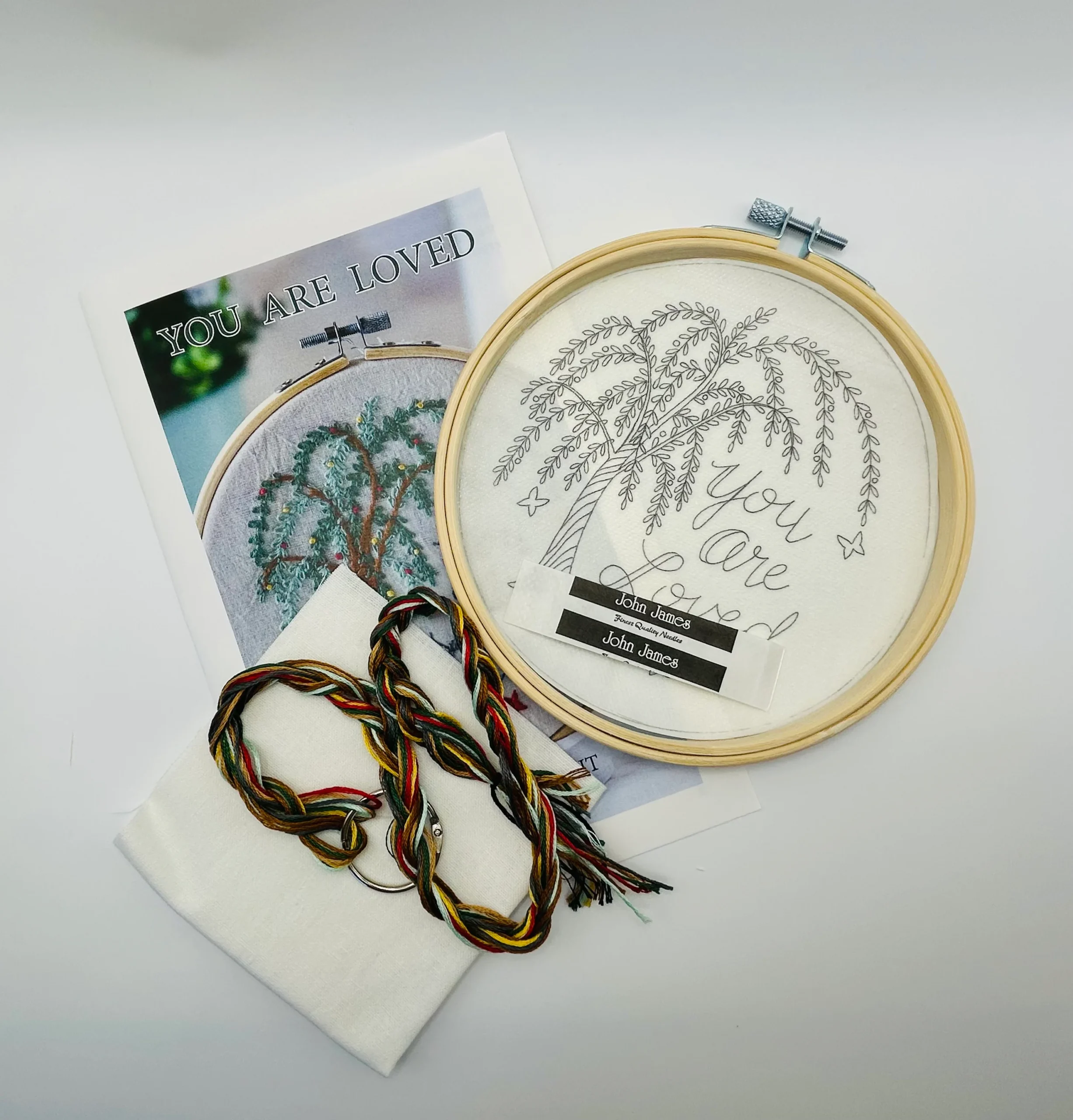 You Are Loved embroidery kit by Deb Strain including hoop, fabric, floss, and needle