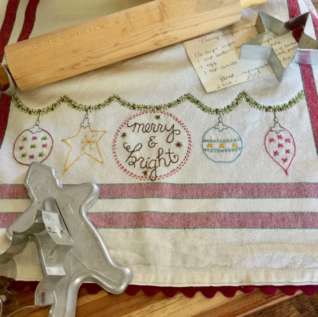 Merry & Bright dishtowel embroidery kit by Bareroots featuring Christmas garland design with towel and supplies