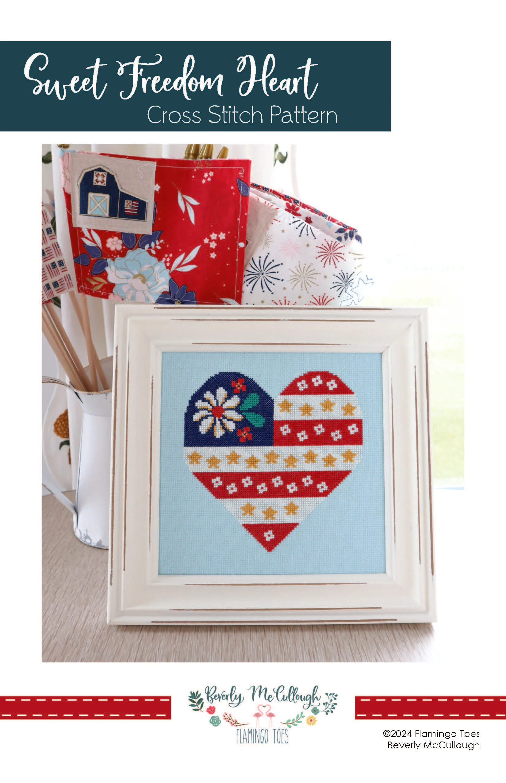 Sweet Freedom Heart Flag patriotic cross stitch pattern stitched on aqua blue fabric
