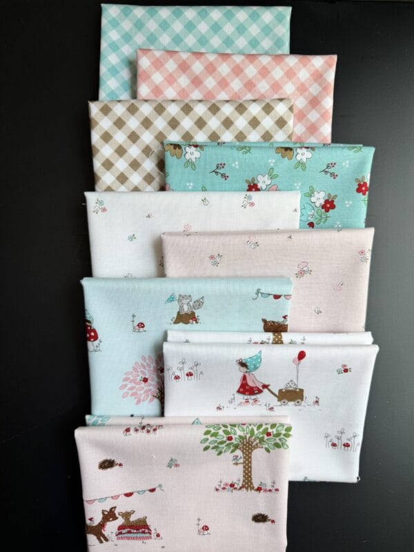 Whimsical Woodland Curated Fat Quarter Bundle featuring 9 coordinating fat quarters by Tasha Noel for Riley Blake Designs
