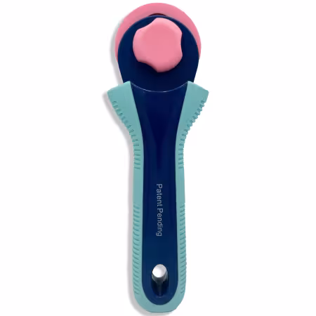 Famore 45mm rotary cutter and blade bundle featuring ergonomic handle with precision ball bearings for smooth, effortless fabric cutting.