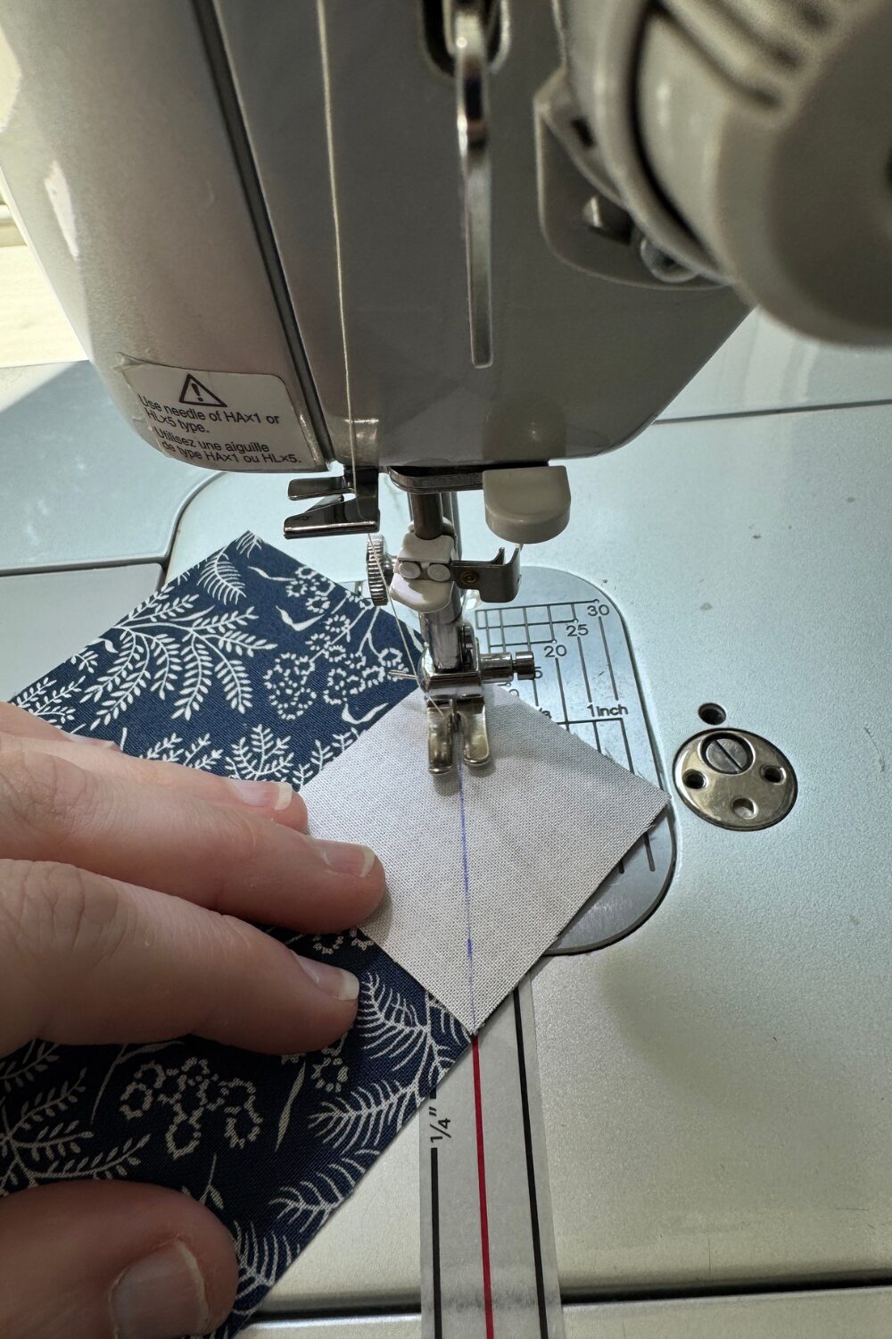 Stitching down the sew and flip corners on a sewing machine